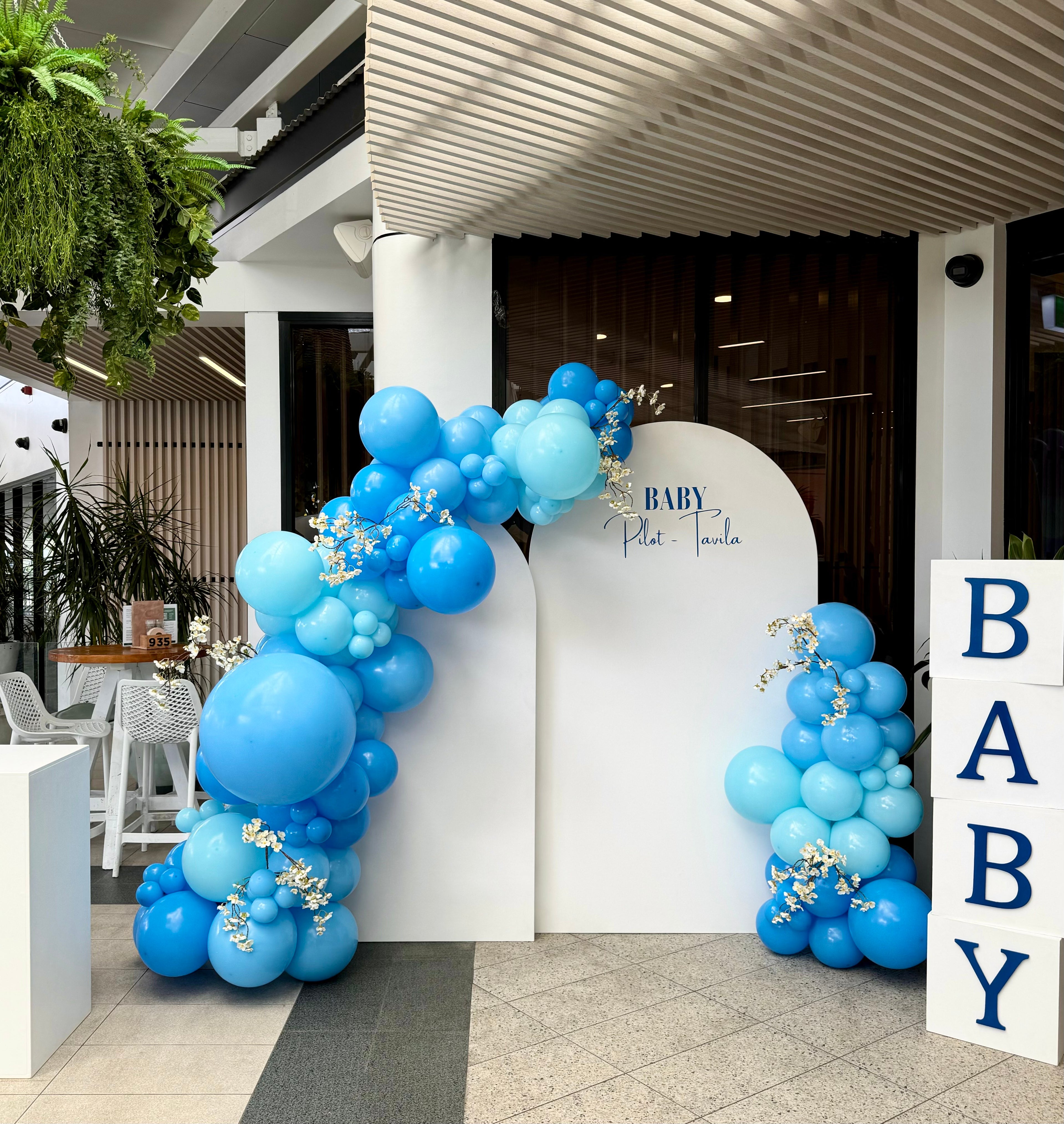 Joyful baby shower setup in Brisbane with pastel florals and balloons

Gold Coast baby shower with dreamy décor and personalised signage

Sunshine Coast baby shower with fun, playful details and custom styling

Elegant baby shower tablescape with flowers, balloons, and soft colour palette

Bespoke baby shower backdrop for a memorable milestone celebration