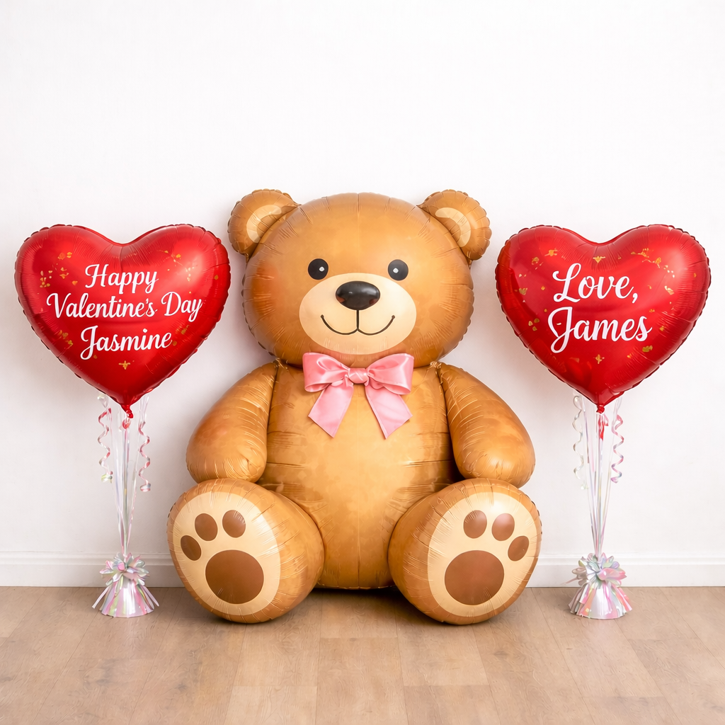 Large foil teddy with two red foil helium heart balloons featuring personalised messages for Valentine’s Day surprises in Brisbane and Gold Coast”