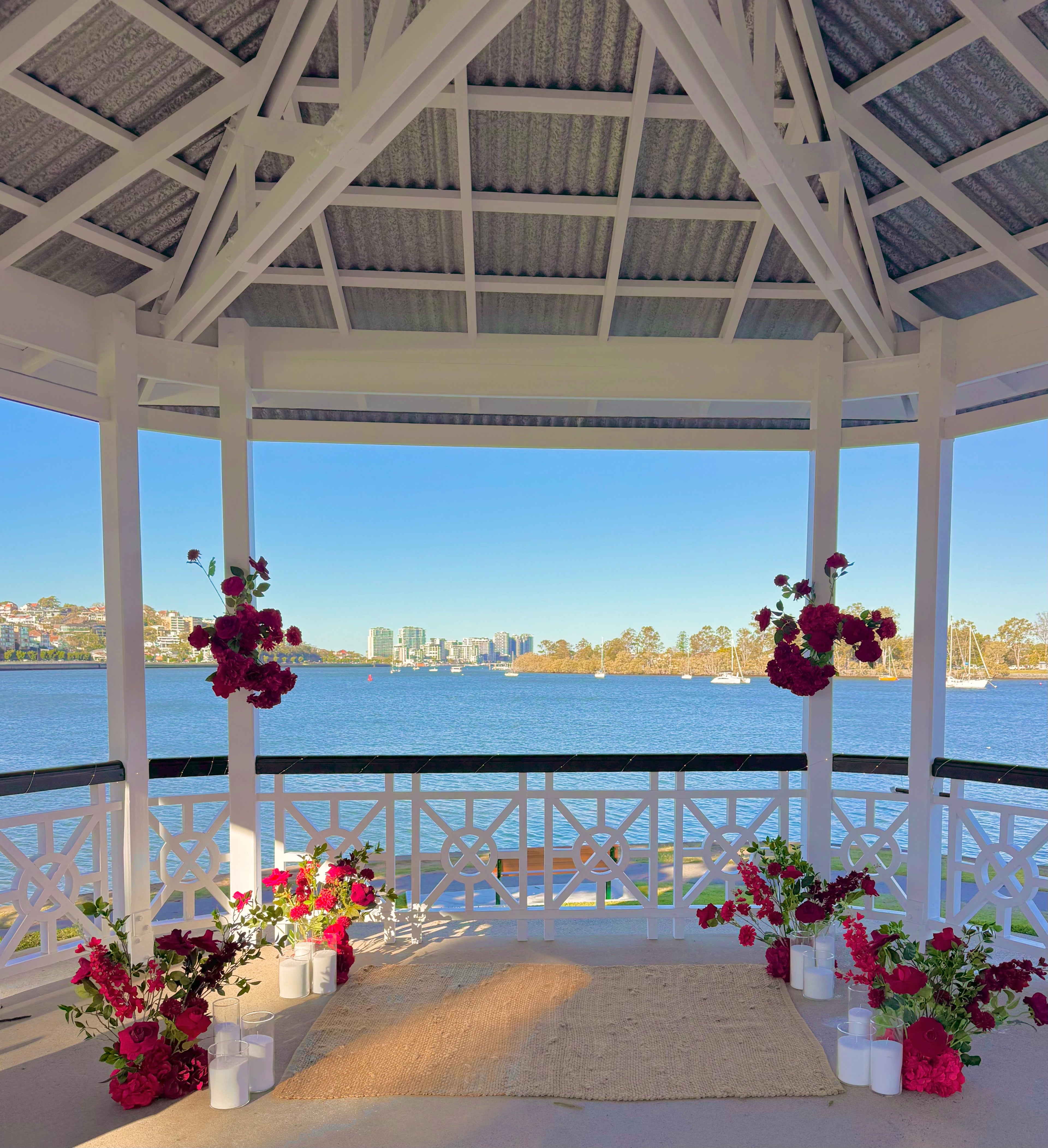 Luxury proposal setup on Gold Coast with floral accents and candles

Romantic Brisbane proposal with personalised signage and flowers

Sunshine Coast intimate proposal with elegant décor and sunset backdrop

Large-scale floral proposal installation for a memorable Gold Coast proposal

Picture-perfect proposal with balloons, florals, and elegant table styling